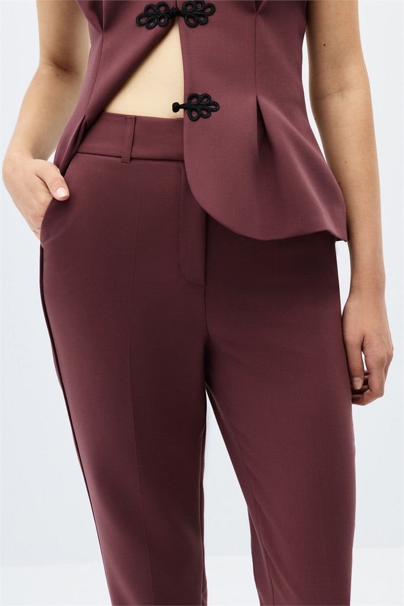 Biyeli dar paça pantolon