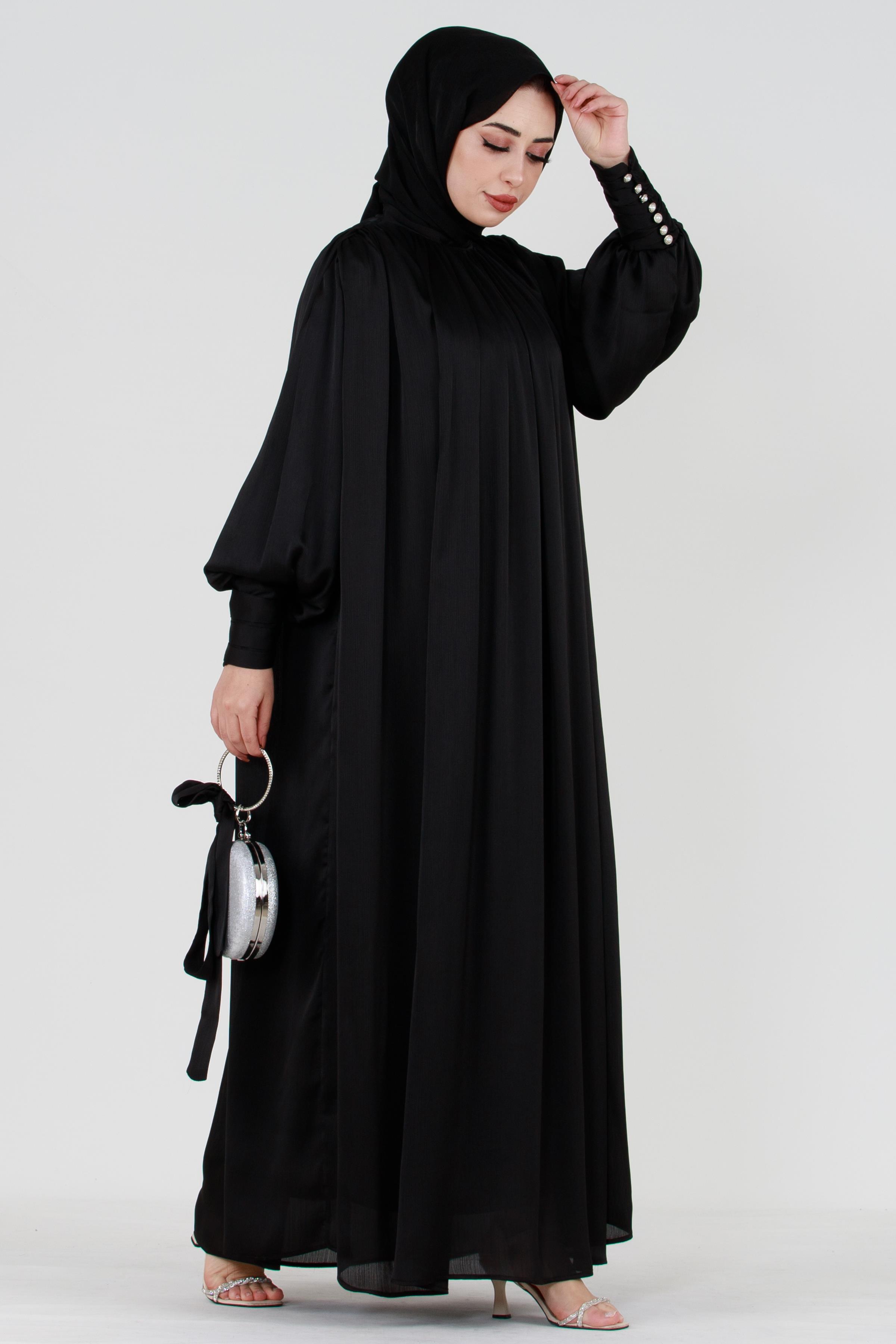 Black Modest Evening Gown with Detailed Cape and Pearl Sleeves.