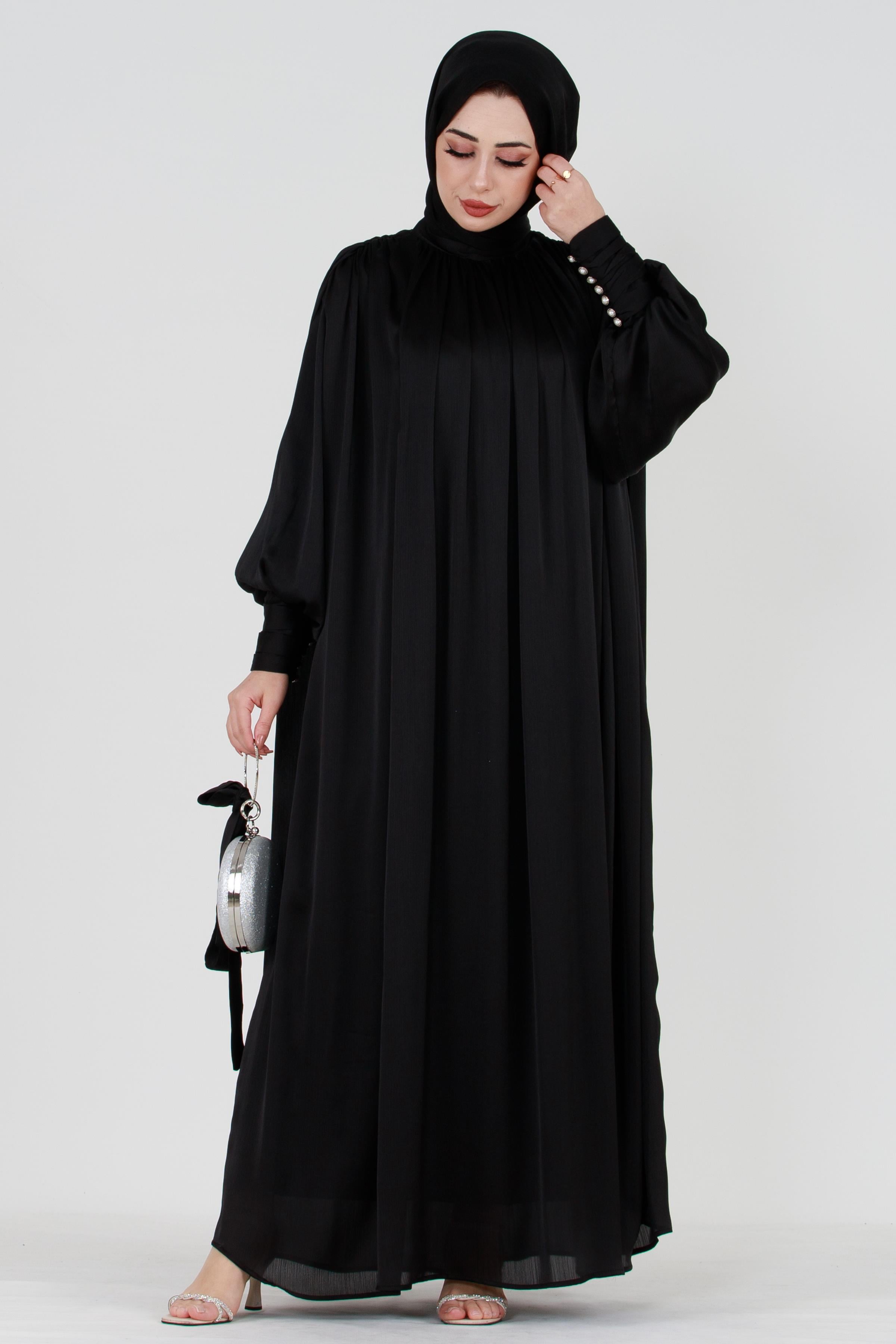 Black Modest Evening Gown with Detailed Cape and Pearl Sleeves.