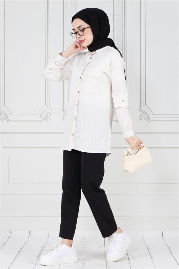 تونيك أبيض بتفاصيل على الأكمام