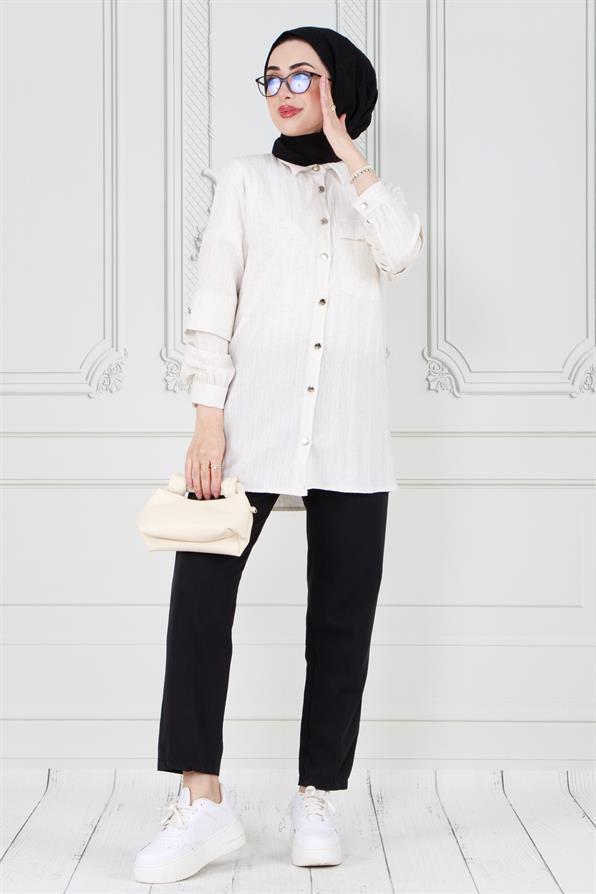 تونيك أبيض بتفاصيل على الأكمام