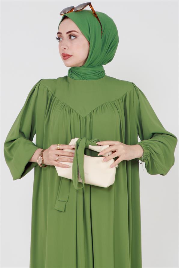 فستان حجاب بلون أخضر فستقي