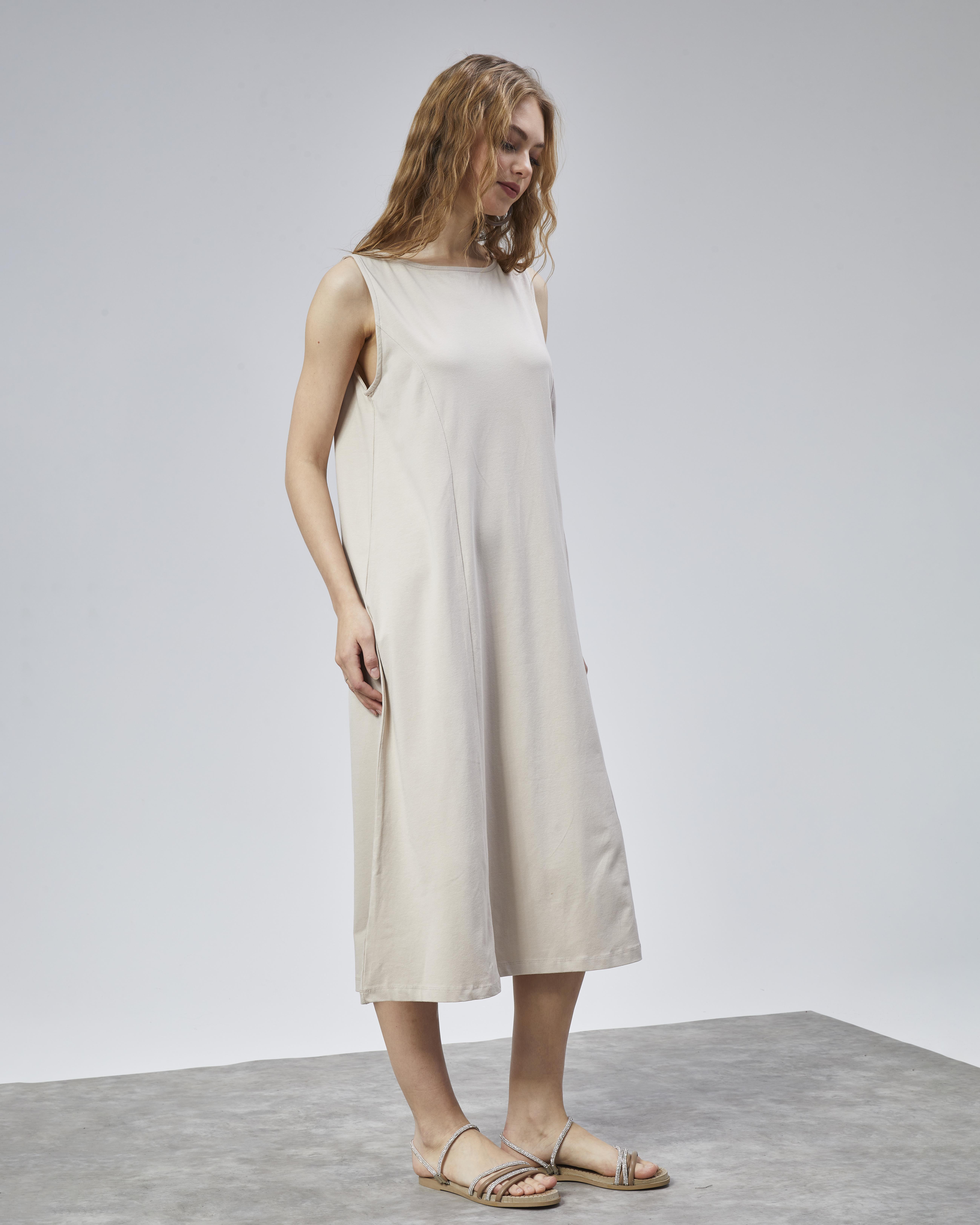 Kadın Halter Yaka Sıfır Kol Düz Oversize Midi Boy Krem Elbise