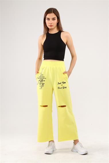 Fancy Kadın Beli Lastikli Dizi Yırtık Detaylı Zincirli Slogan Baskılı Bol Paça Pantolon