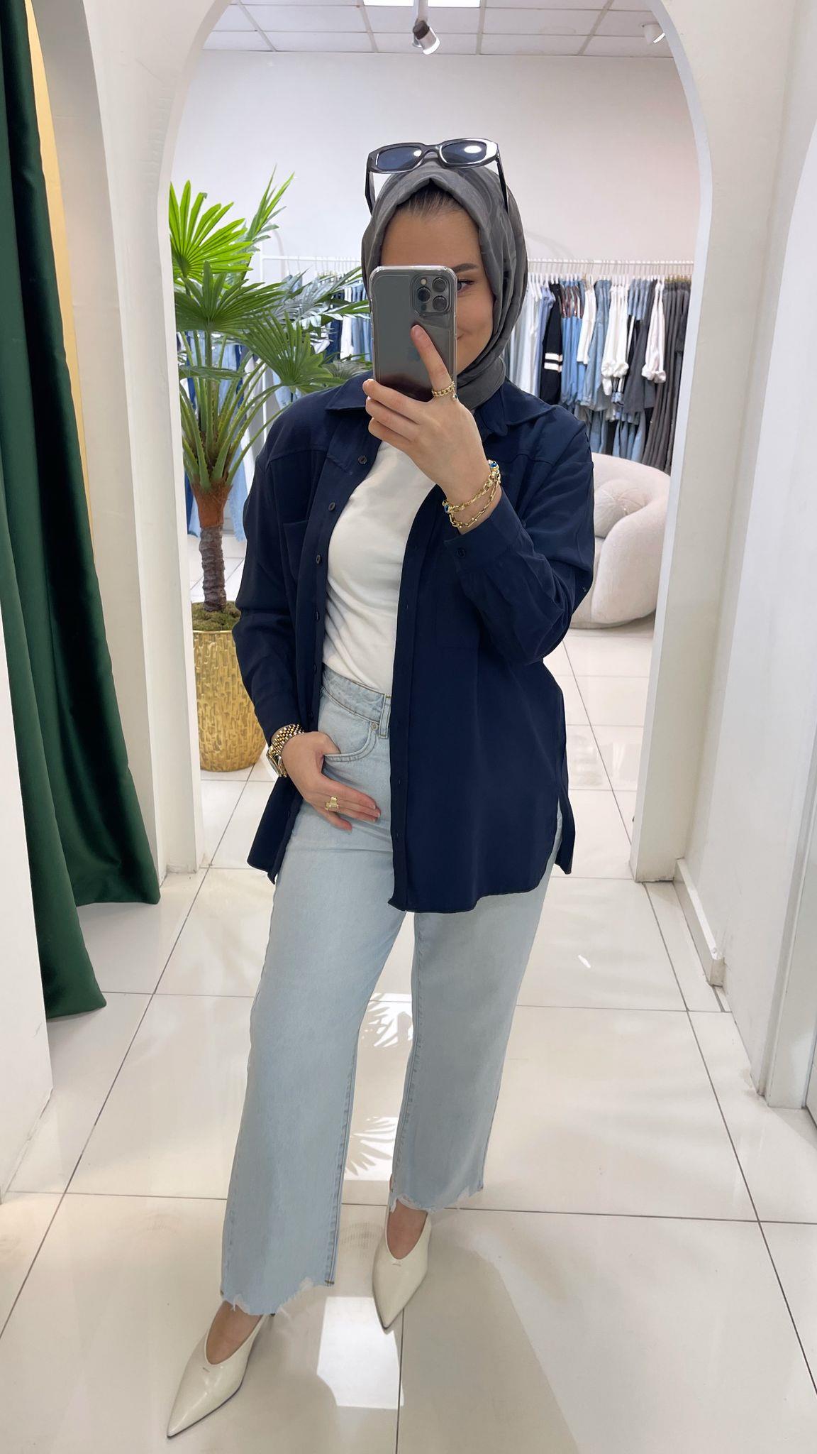 PantolonYIRTIKLI MOM JEAN