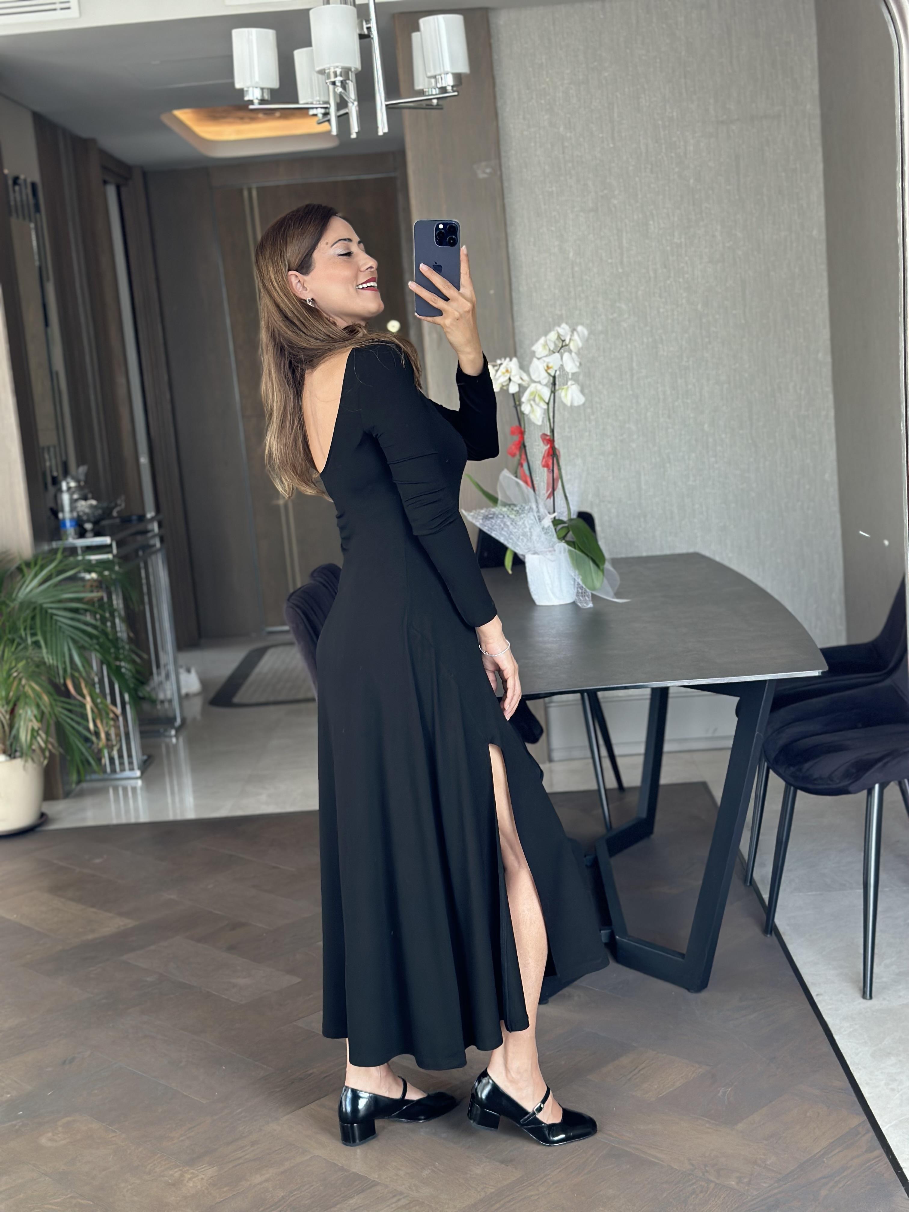 Siyah Likralı Örme Sırtı U Dekolteli Çift Yırtmaçlı Kadın Elbise