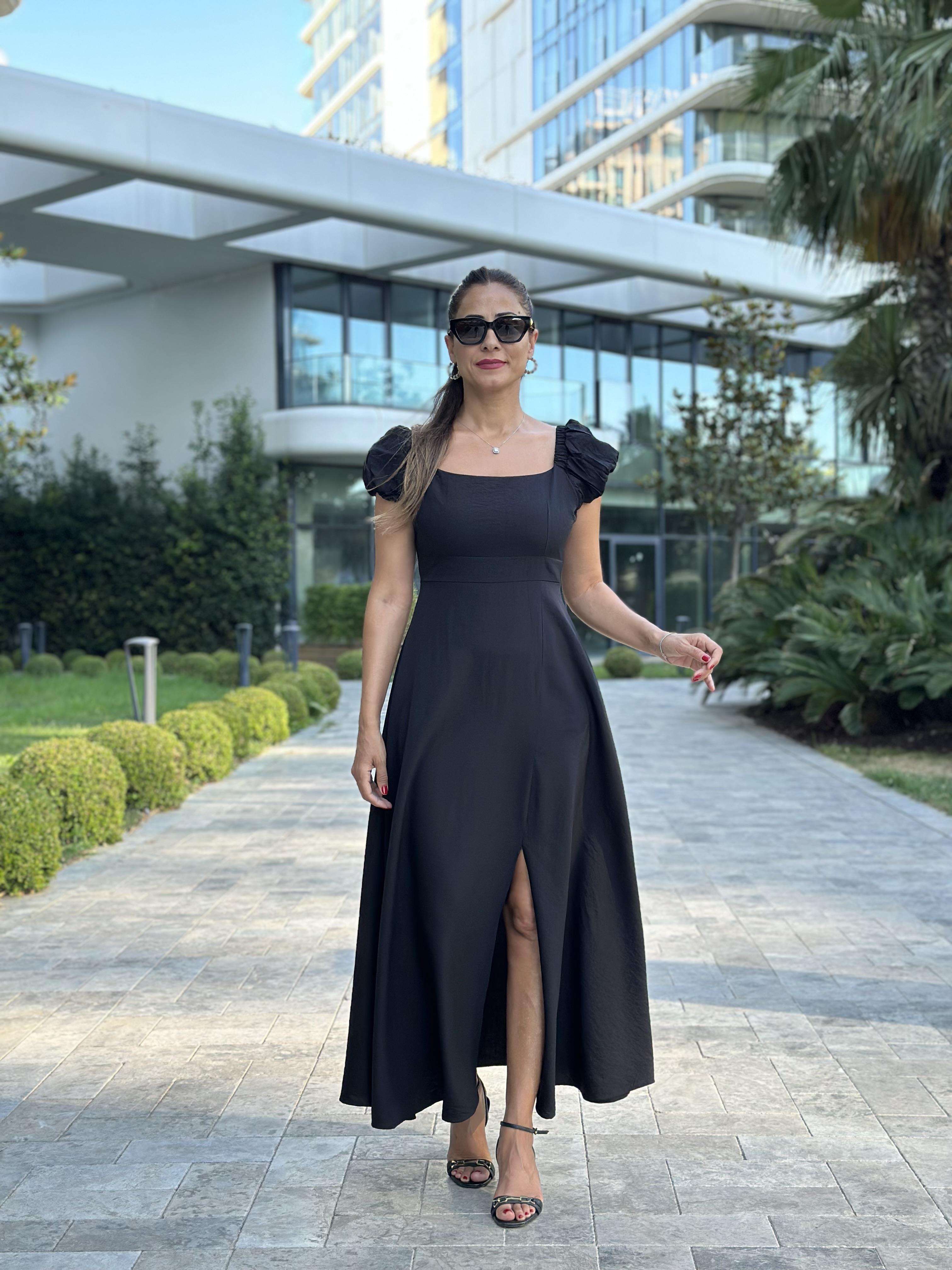 Siyah Omuzları Lastikli Arkası Dekolteli Yırtmaçlı Midi Boy Kadın Elbise 