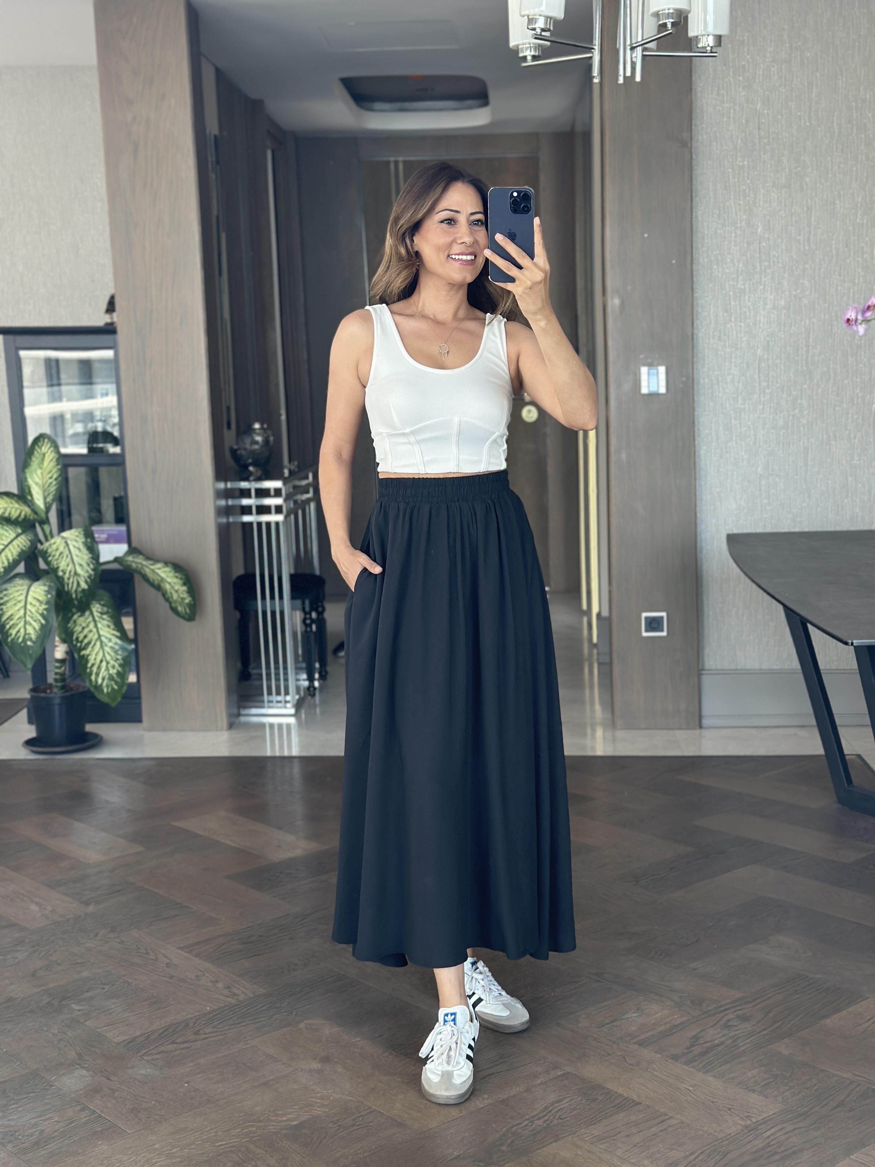 Siyah Tensel Kumaş Beli Lastikli Cepli Kadın Midi Boy Etek