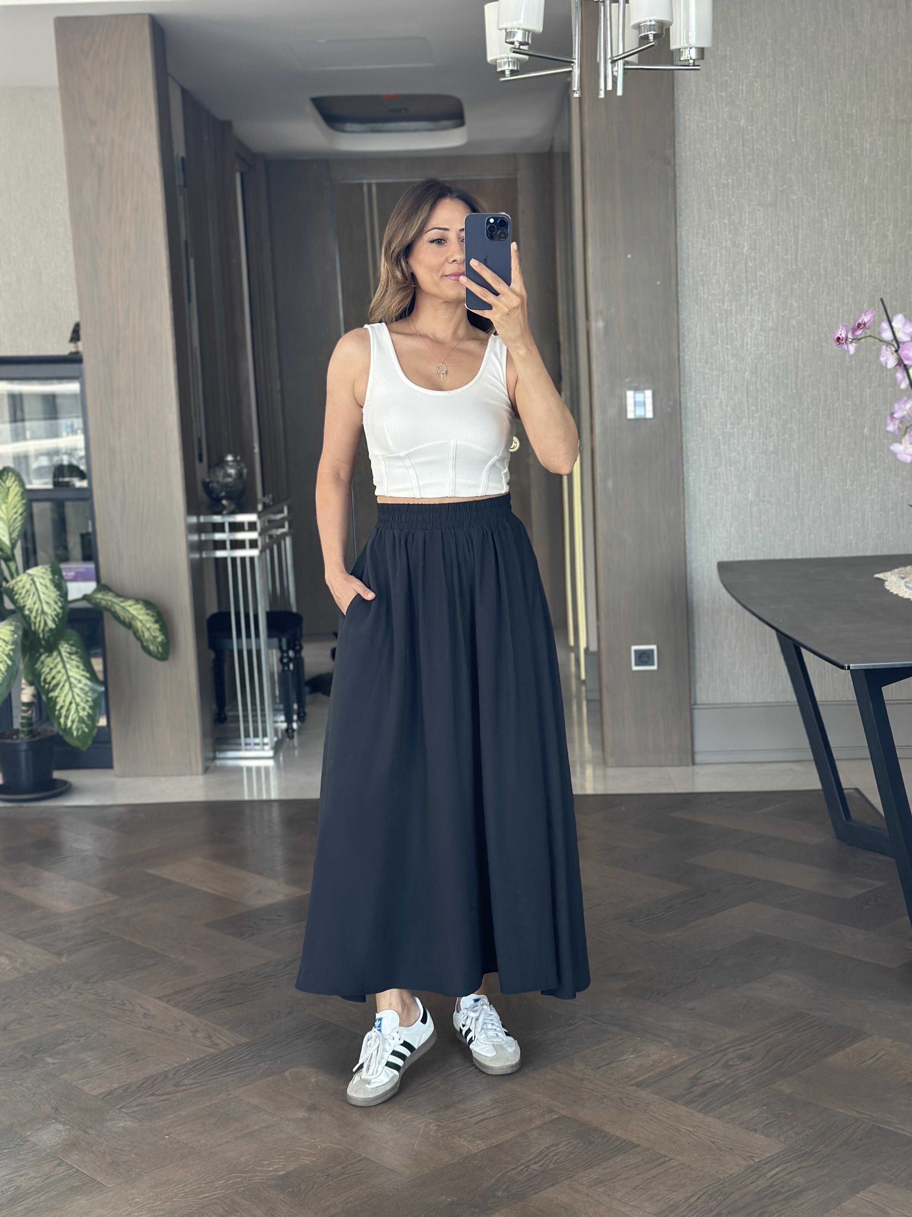 Siyah Tensel Kumaş Beli Lastikli Cepli Kadın Midi Boy Etek