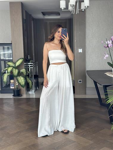 Beyaz Ters Dikiş Parçalı Bağcıklı Geniş Paça Kadın Pantolon