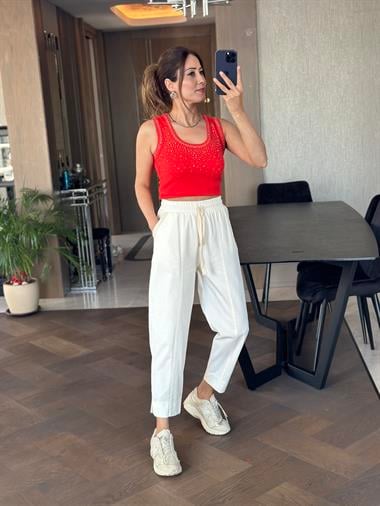 Ekru Gabardin Cebi Biyeli Paçası Minik Yırtmaçlı Kadın Pantolon