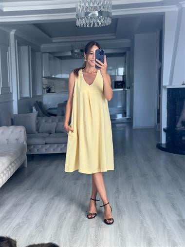 Sarı Keten Önü Pensli V Yaka Sıfır Kol Cepli Kadın Midi Boy Elbise