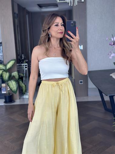 Sarı Ters Dikiş Parçalı Bağcıklı Geniş Paça Kadın Pantolon