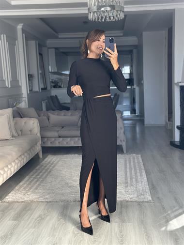 Siyah Bisiklet Yaka Uzun Kol Beli Dekolteli Sandy Maksi Boy Kadın Elbise