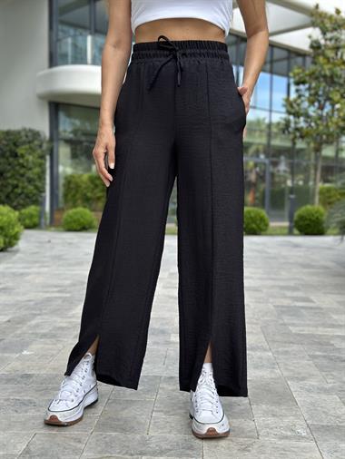 Siyah Paçası Yırtmaçlı Bağcıklı Tin Tin Kadın Pantolon