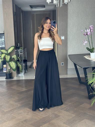 Siyah Ters Dikiş Parçalı Bağcıklı Geniş Paça Kadın Pantolon