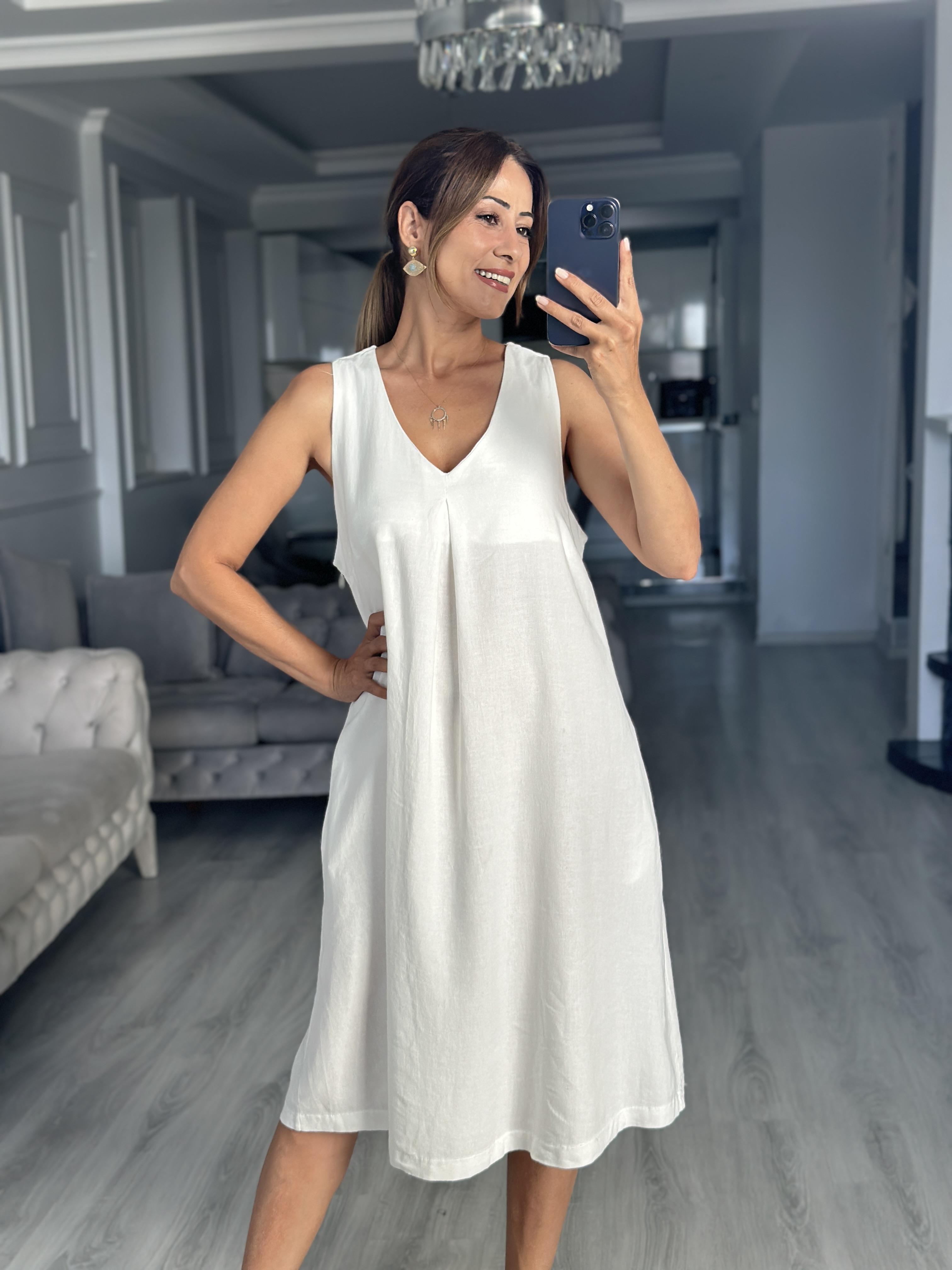 Beyaz Keten Önü Pensli V Yaka Sıfır Kol Cepli Kadın Midi Boy Elbise