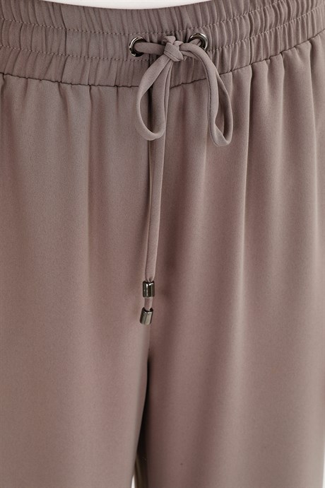 Beli Lastikli Bol Kesim Pantolon