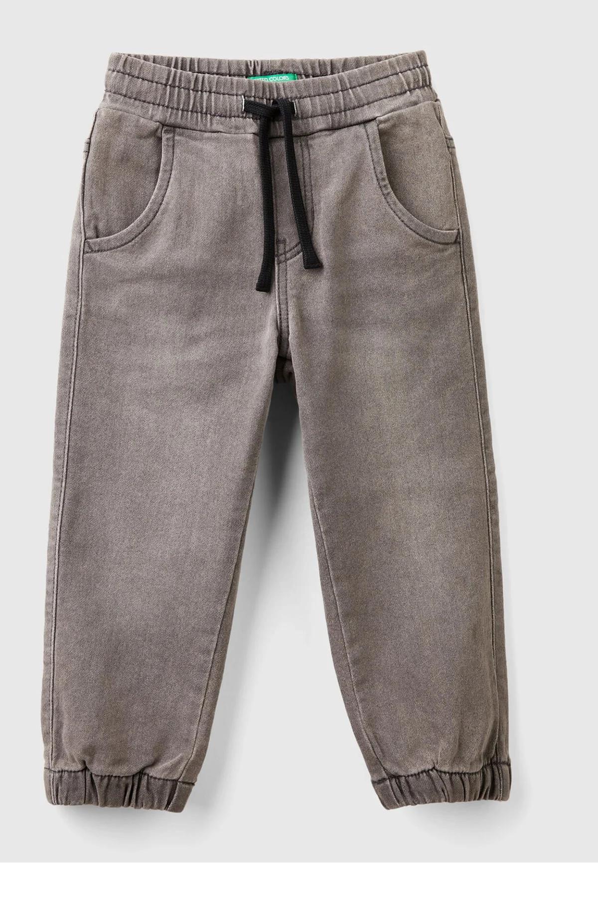 United Colors of Benetton Erkek Çocuk Koyu Denim Arka Cebi Logolu Lastik Paça Ağartılmış Denim Pantolon