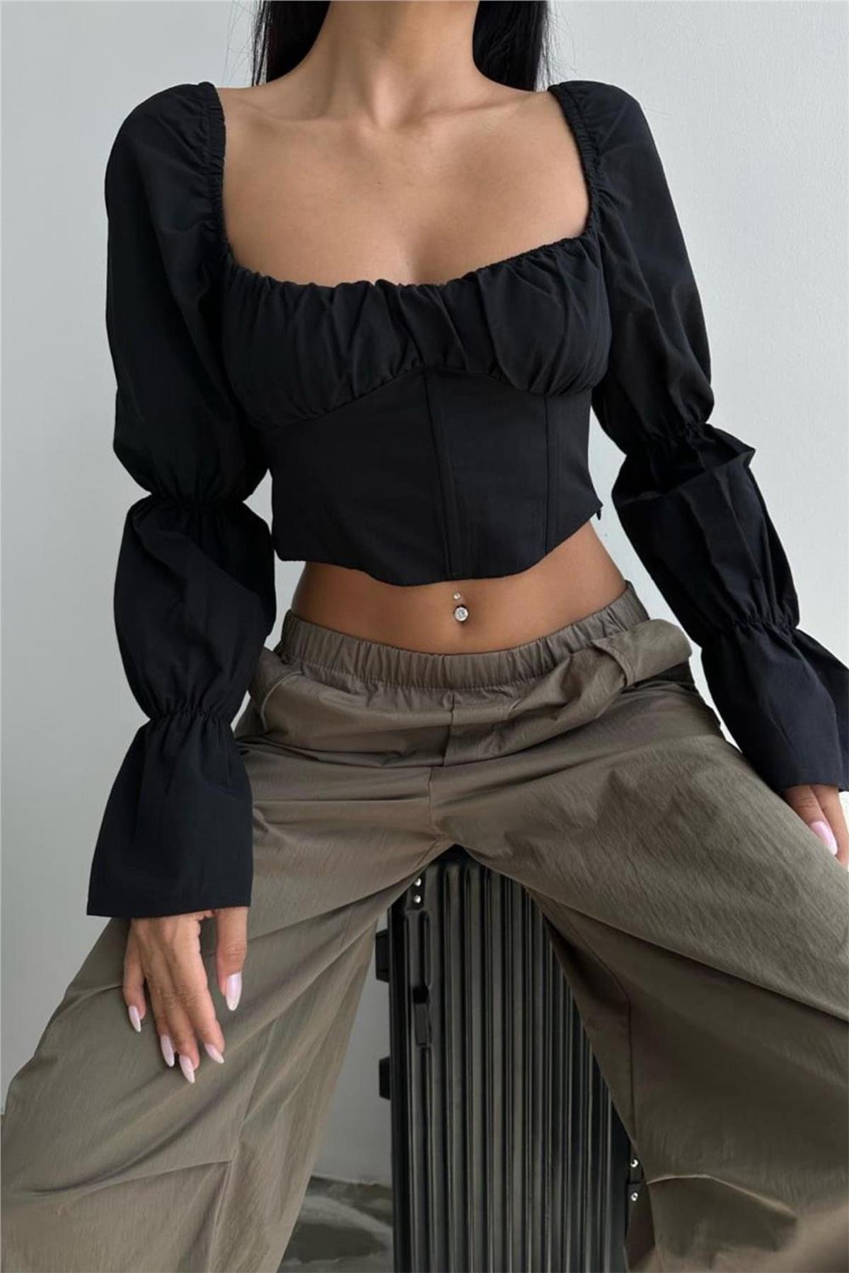 بلوزة بأكمام إسبانية