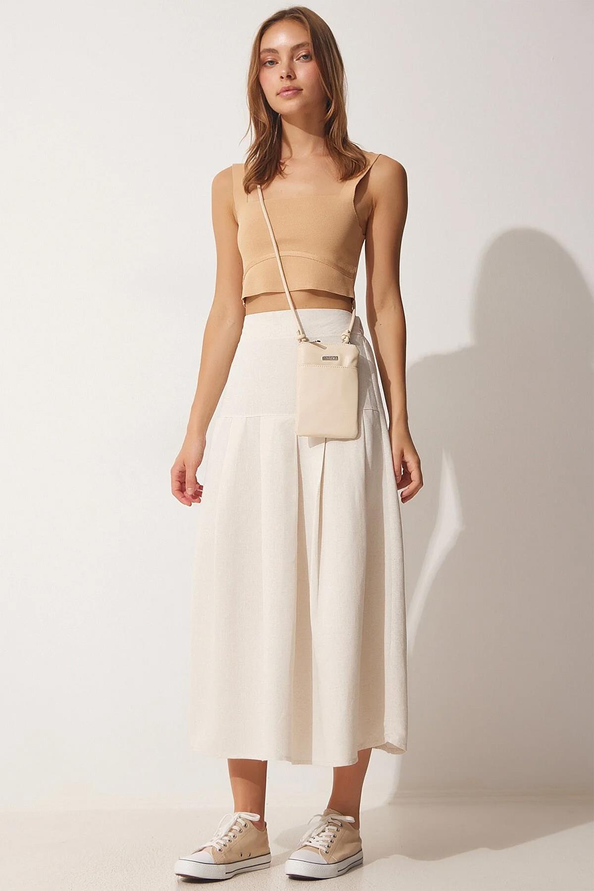 VORDERER ROCK AUS LEINEN MIT RÜSCHEN