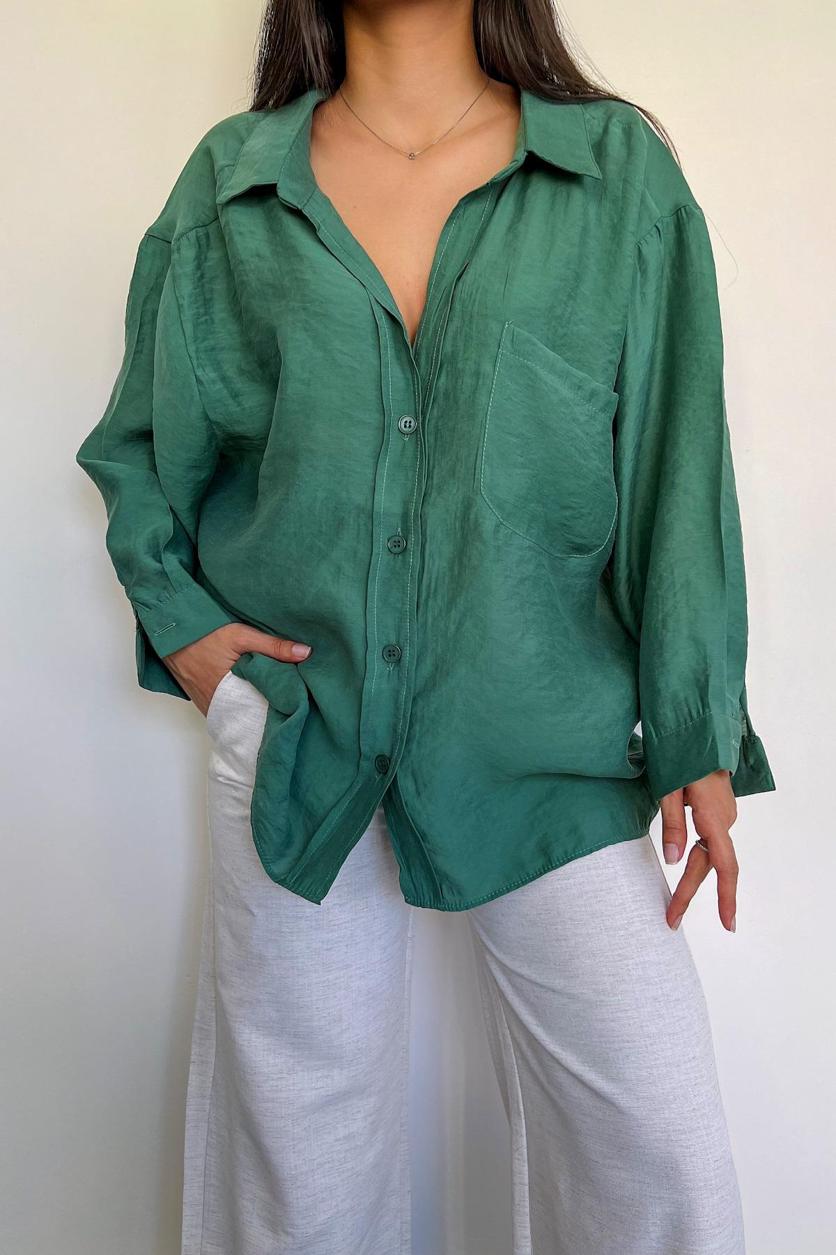 قميص كبير الحجم بأكتاف منخفضة