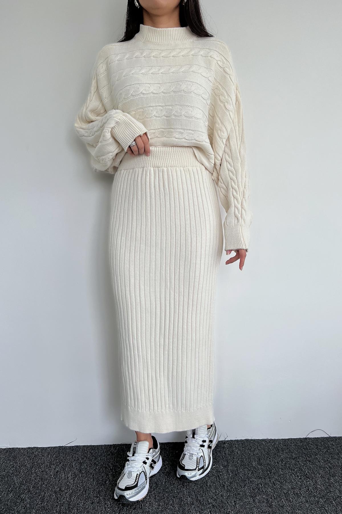 بدلة تريكو بتنورة الخفاش