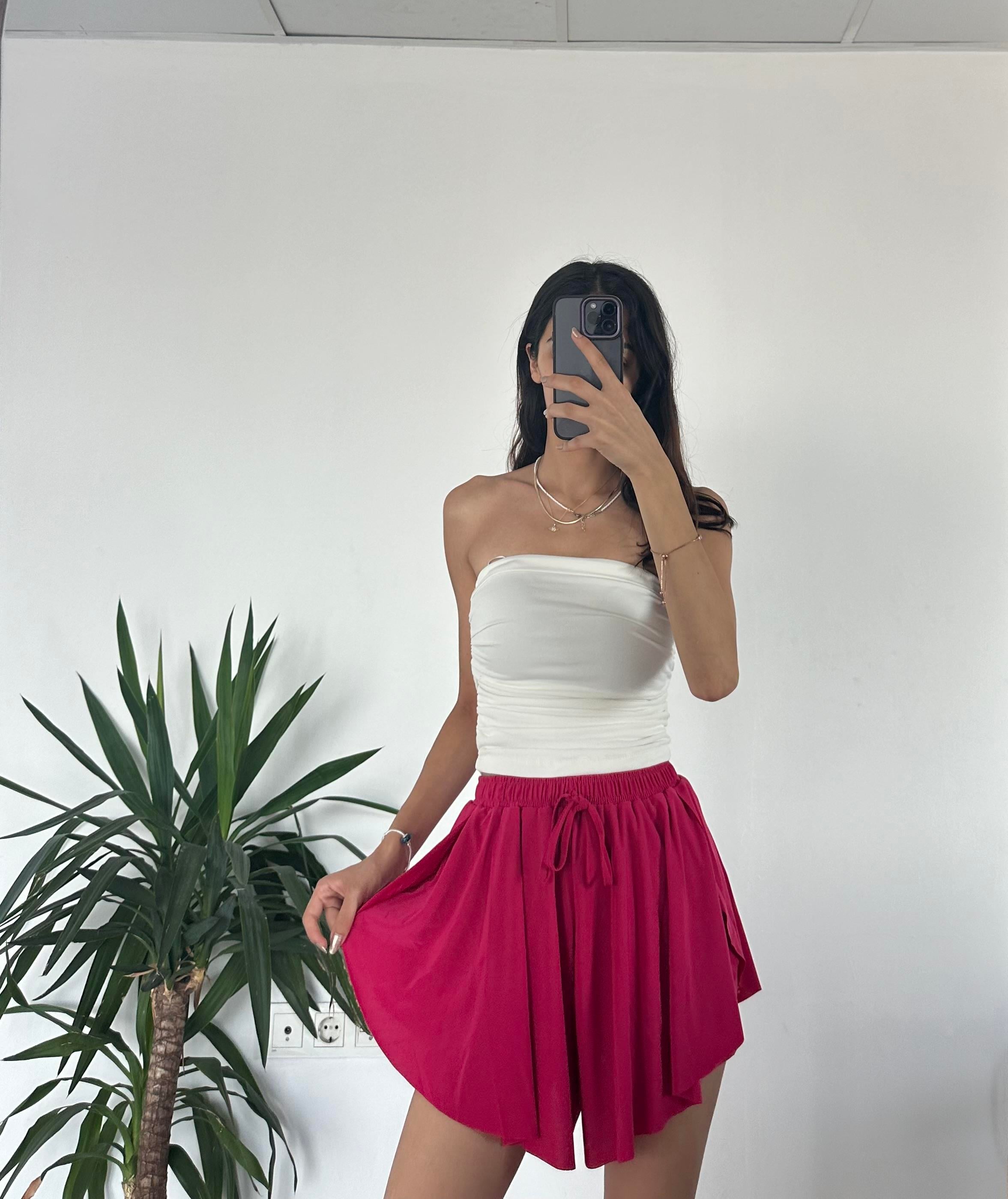 PEMBE ŞORTLU TENİS ETEĞİ