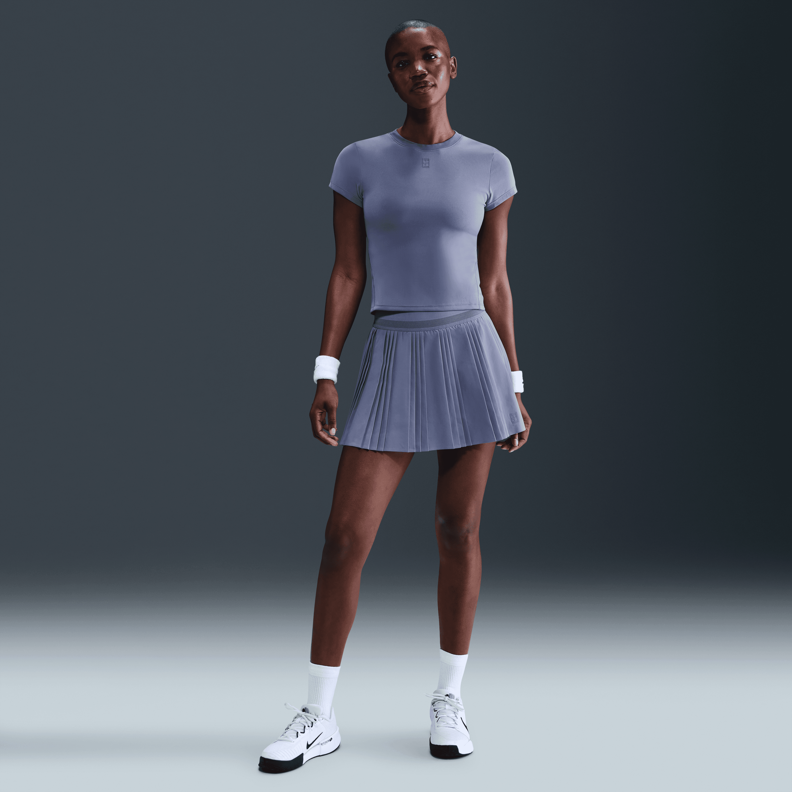 NikeCourt Ace Advantage Yüksek Belli Pileli Kadın Tenis Eteği