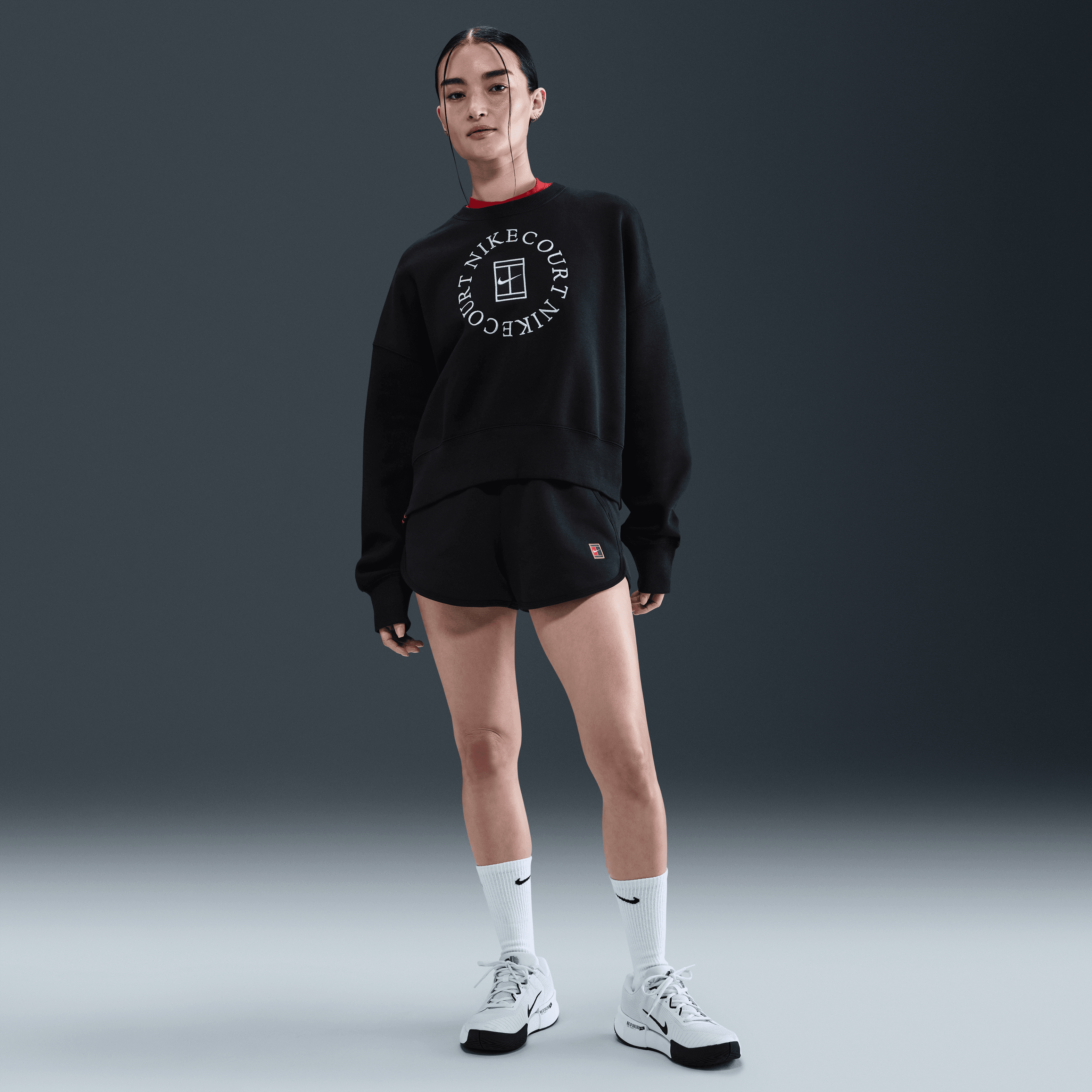 NikeCourt Heritage Phoenix Fleece Ekstra Bol Kesimli Sıfır Yakalı Kadın Sweatshirt'ü