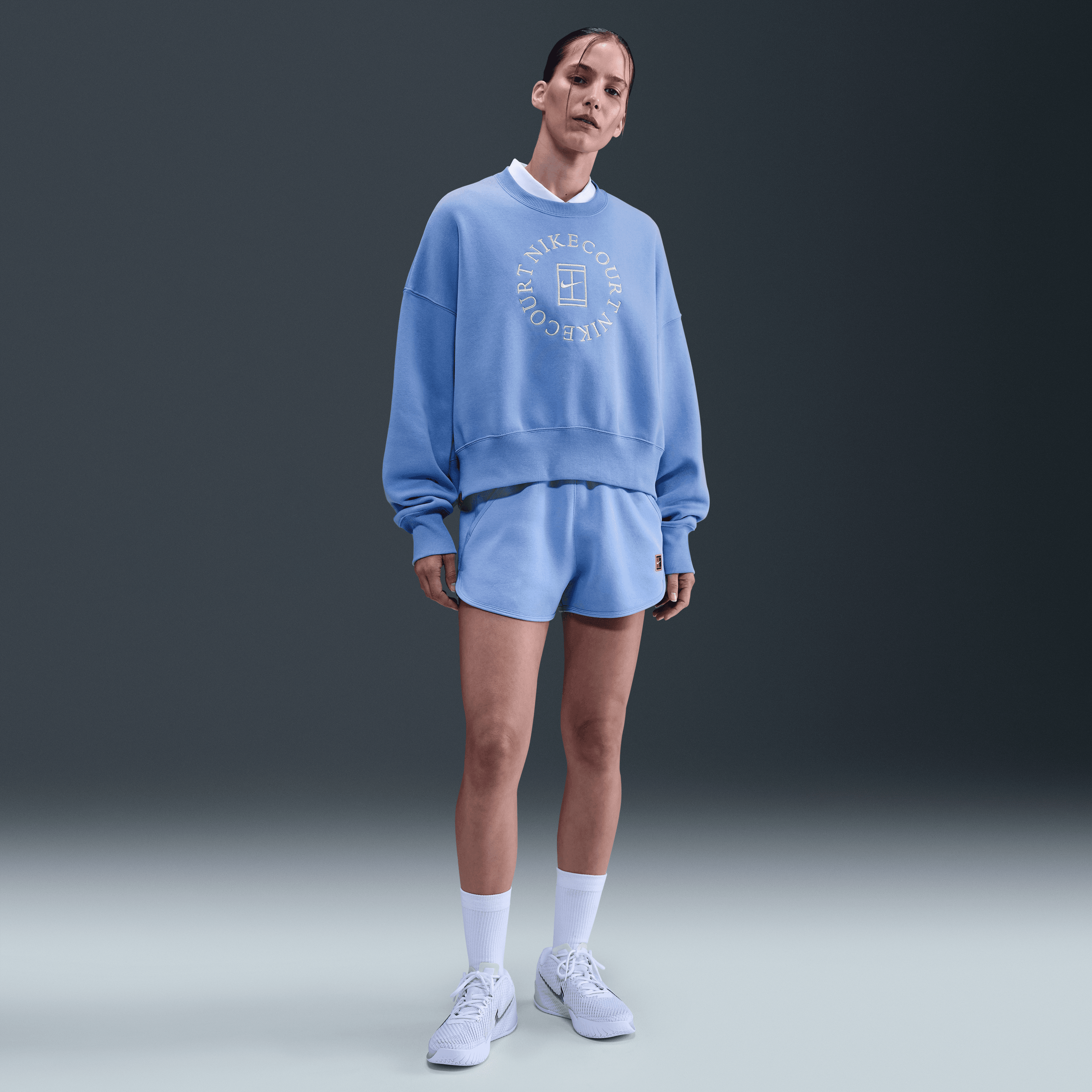 NikeCourt Heritage Phoenix Fleece Ekstra Bol Kesimli Sıfır Yakalı Kadın Sweatshirt'ü