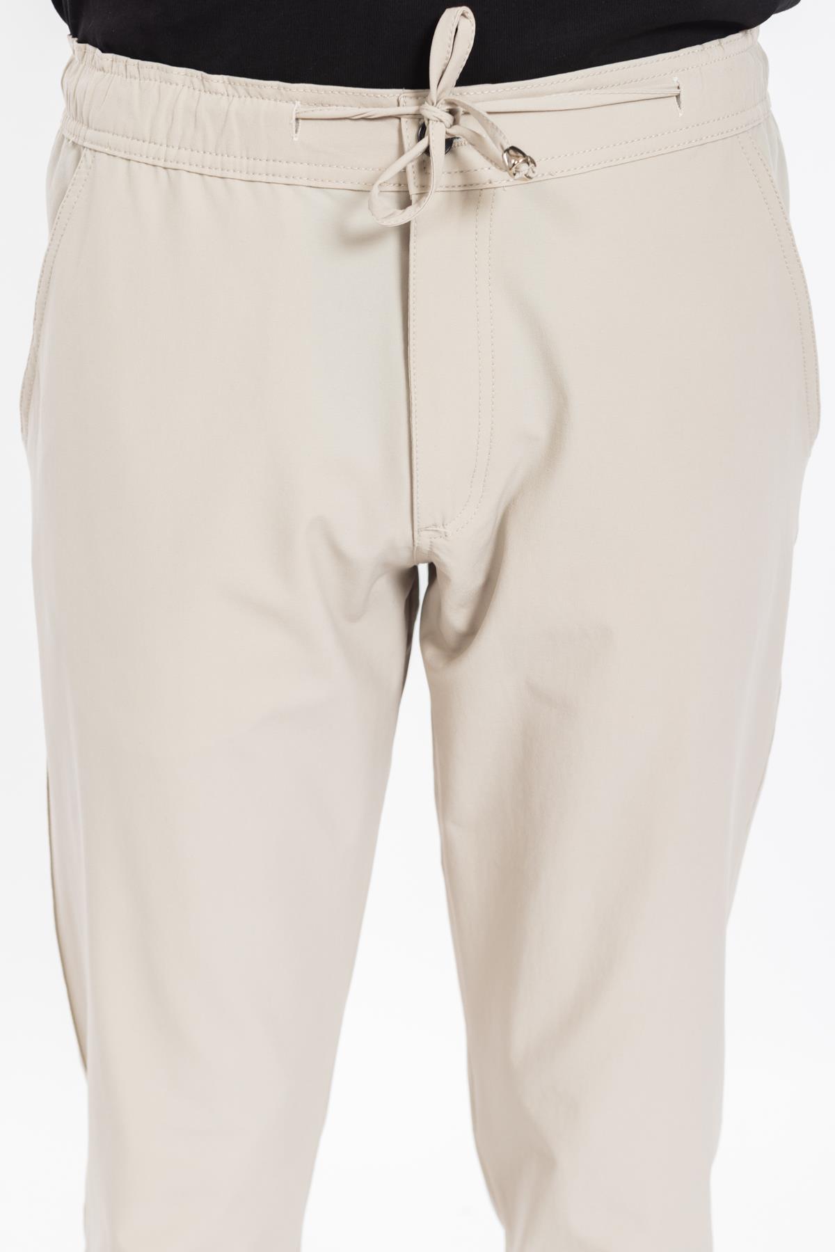 AKN 402 LİKRALI JOGGER PANTOLON TAŞ BEYAZ