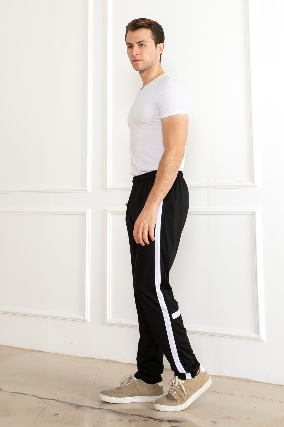 UNISEX ÇOCUK SCUBA KUMAŞ DAR PAÇA LASTİKLİ ESNEK  SARI CİZGİ DETAYLI ESOFMAN ALT
