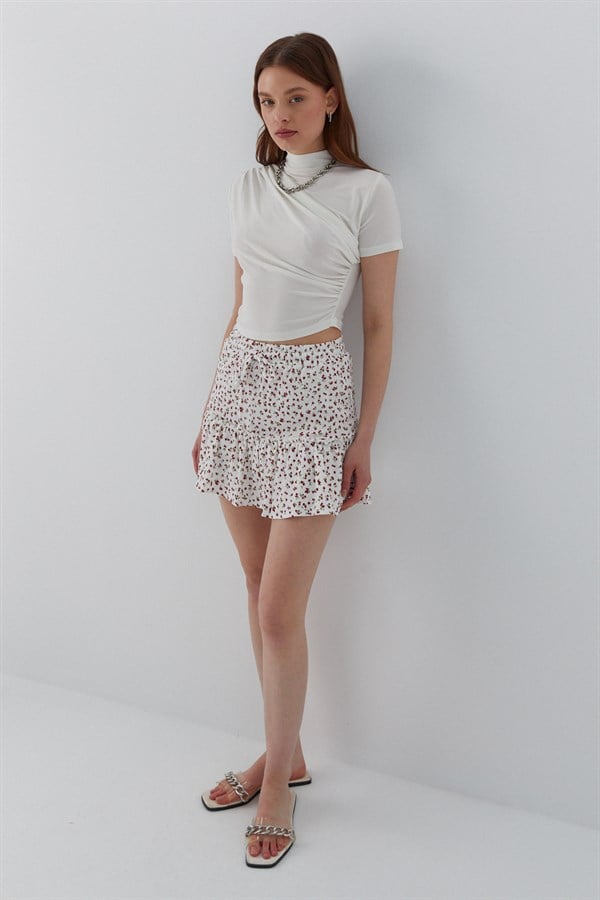 Çiçek Desenli Fırfırlı Mini Şort Etek Ekru