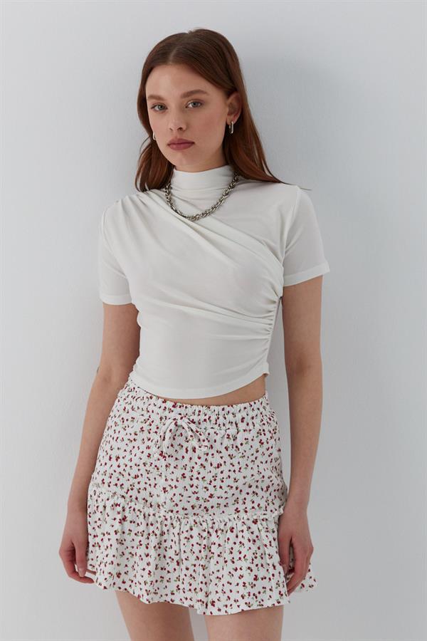 Çiçek Desenli Fırfırlı Mini Şort Etek Ekru