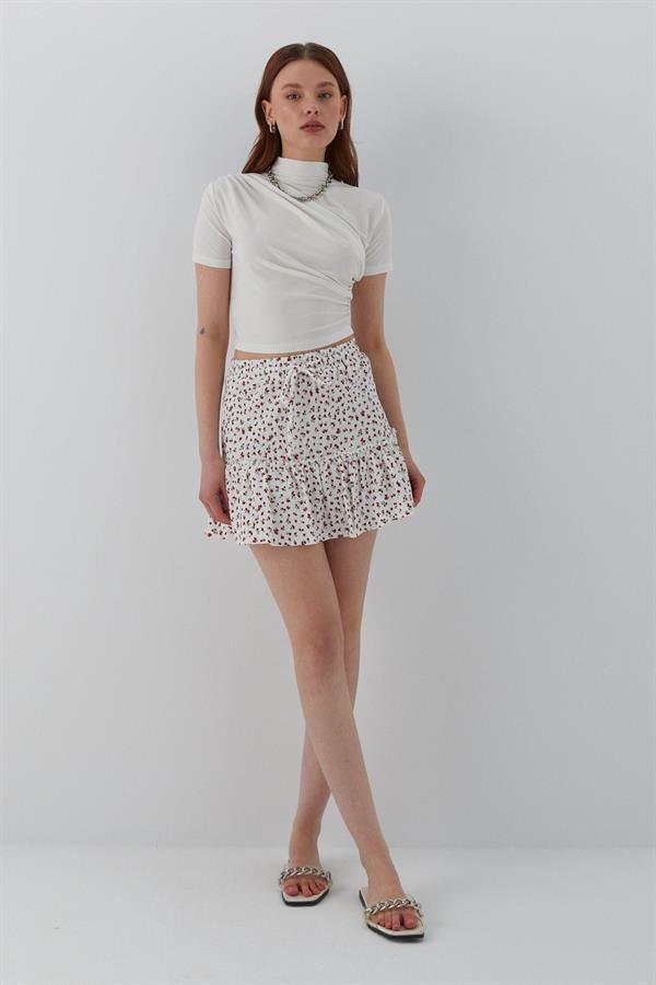 Çiçek Desenli Fırfırlı Mini Şort Etek Ekru
