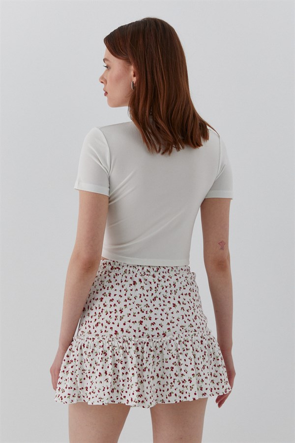 Çiçek Desenli Fırfırlı Mini Şort Etek Ekru