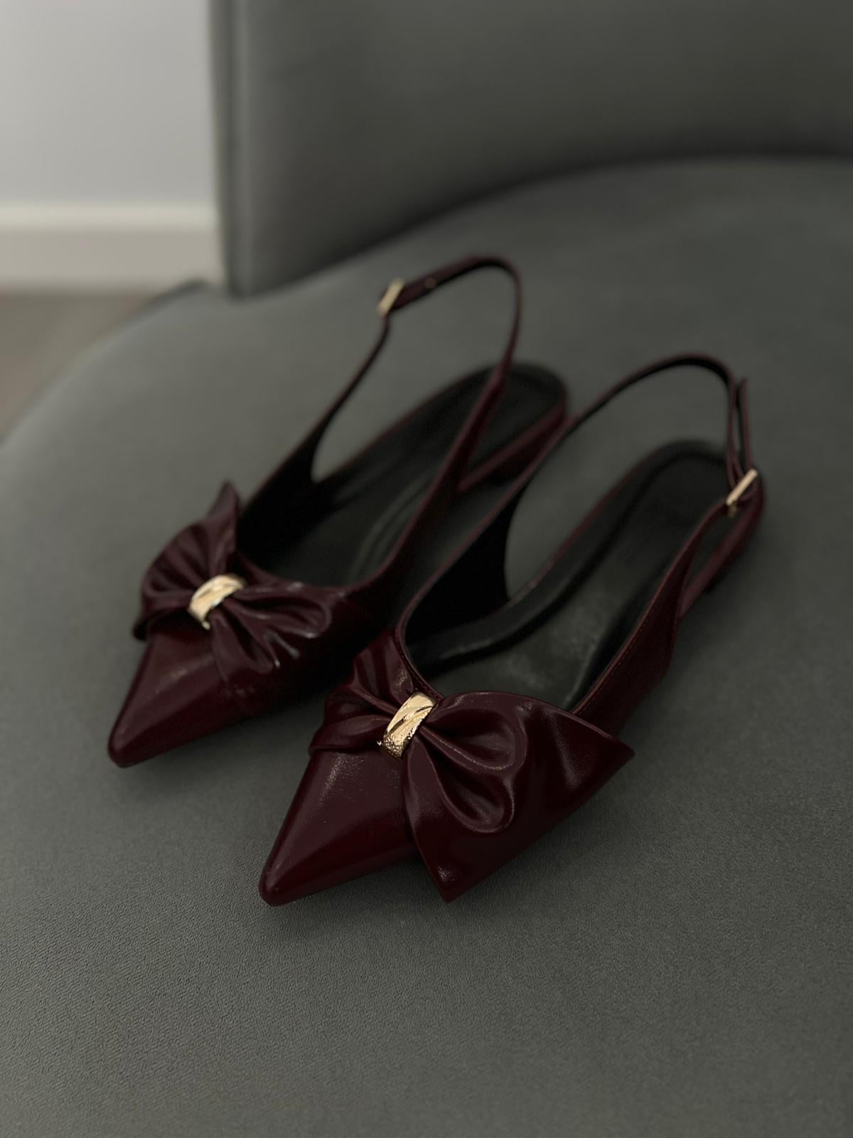 Bordo Renk. Fiyonk detaylı şık babet.36-43 numara arası mevcut