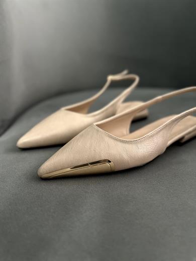 bej gold uç detaylı babet . Şık, rahat ve tam kalıptır. 36–43 numara.