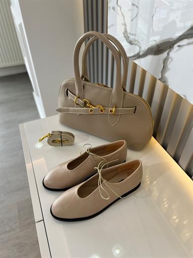 bej  kadın ayakkabısı.ve kombin çanta 