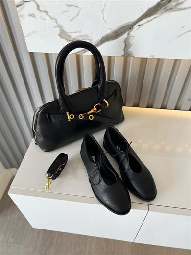 siyah kadın ayakkabısı.ve kombin çanta 