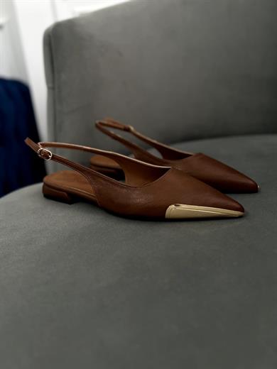 taba gold uç detaylı babet . Şık, rahat ve tam kalıptır. 36–43 numara.