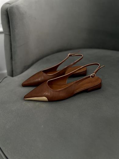 taba gold uç detaylı babet . Şık, rahat ve tam kalıptır. 36–43 numara.