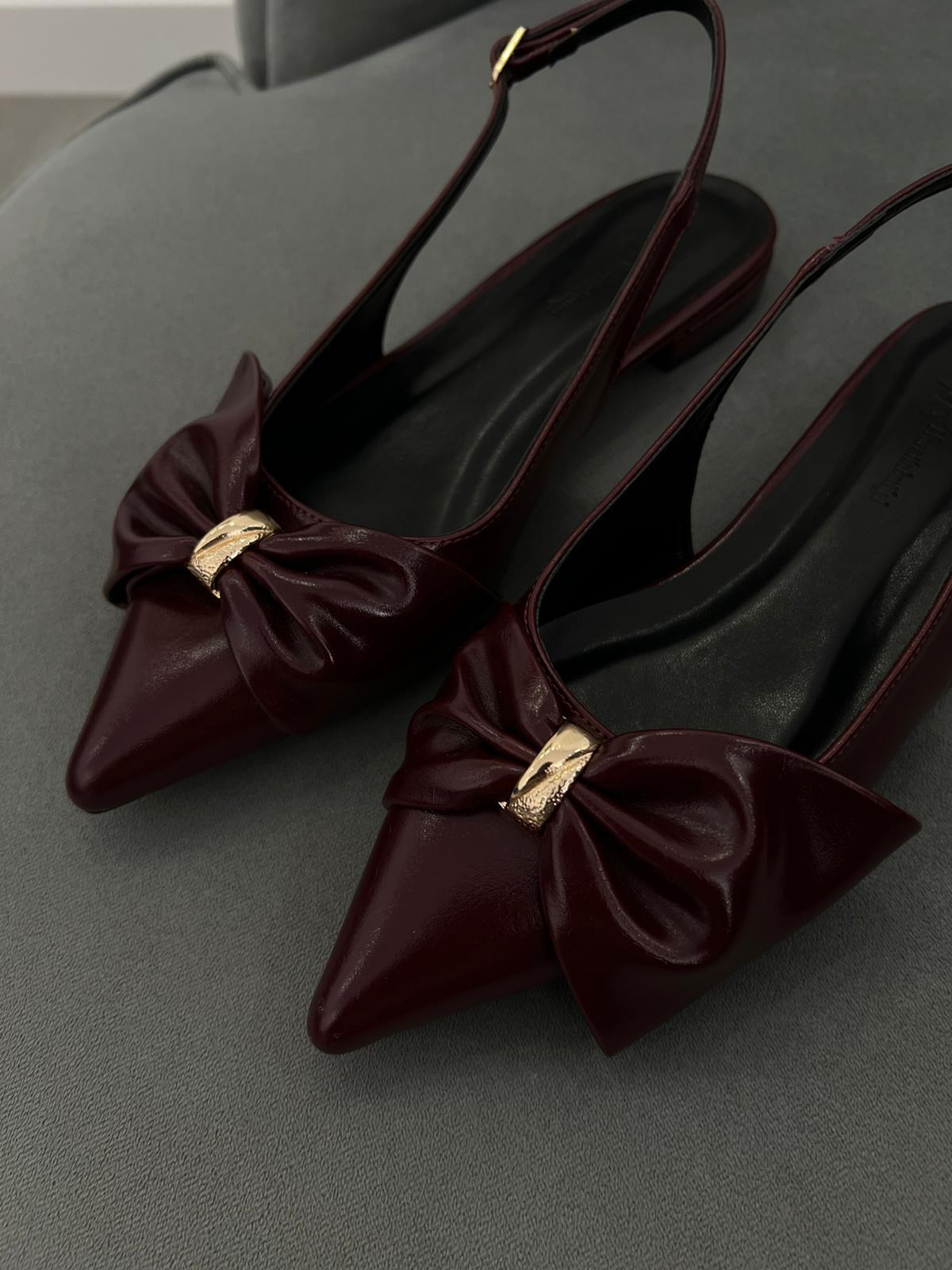 Bordo Renk. Fiyonk detaylı şık babet.36-43 numara arası mevcut