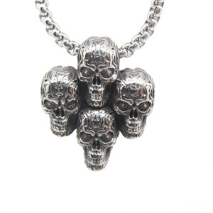 ​Welch Steel Quadruple Skull Necklace