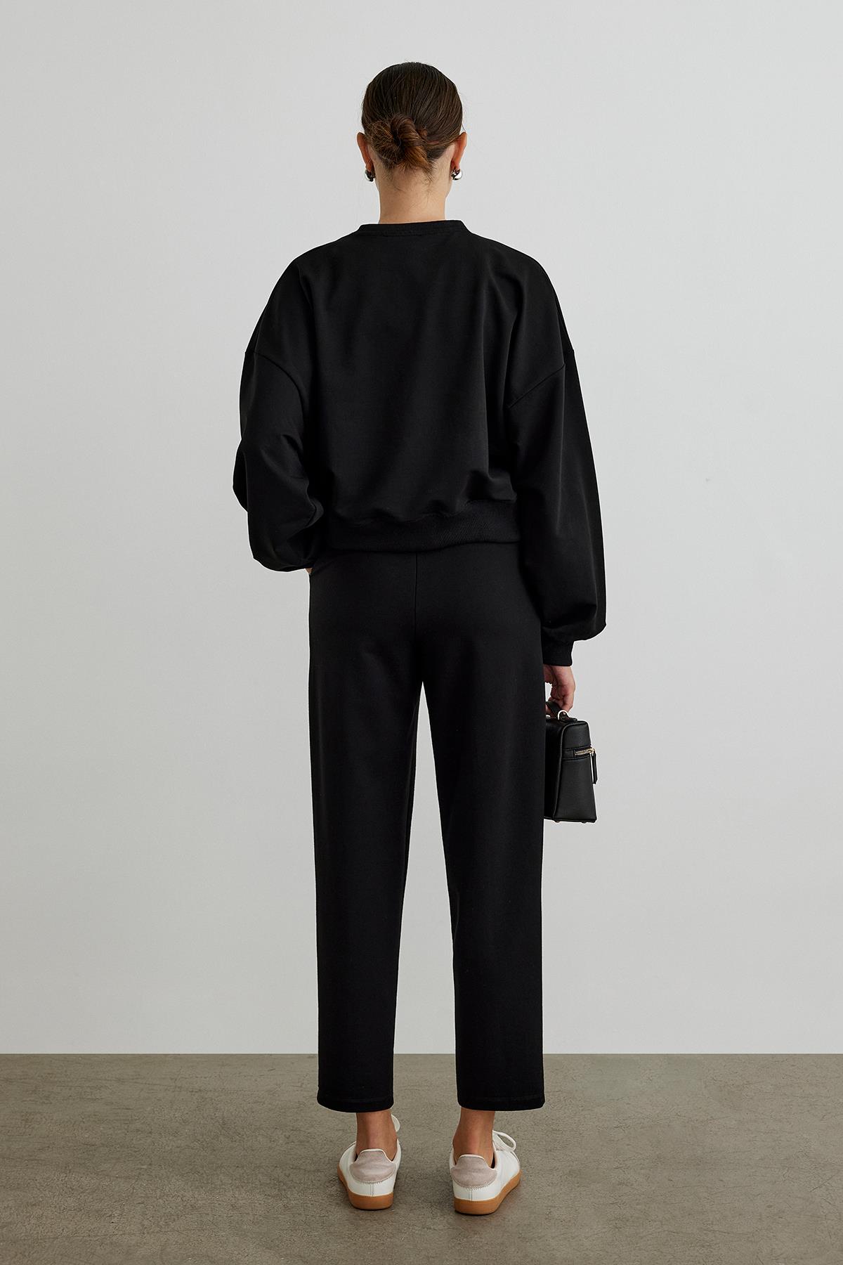 Carrot cropped trousers deals
