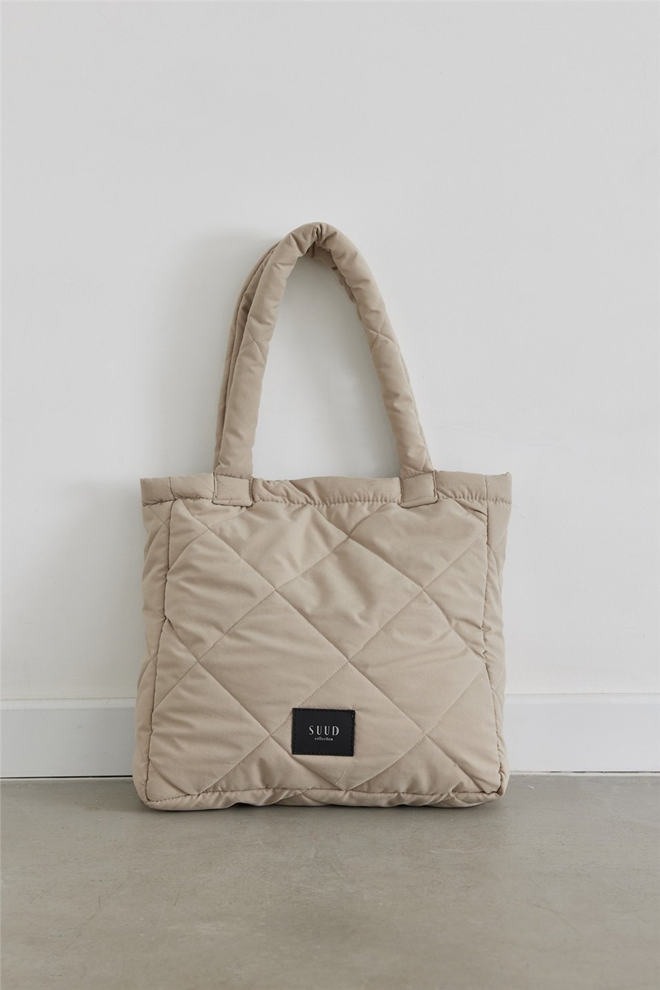 Stone Quilted Puffer Bag