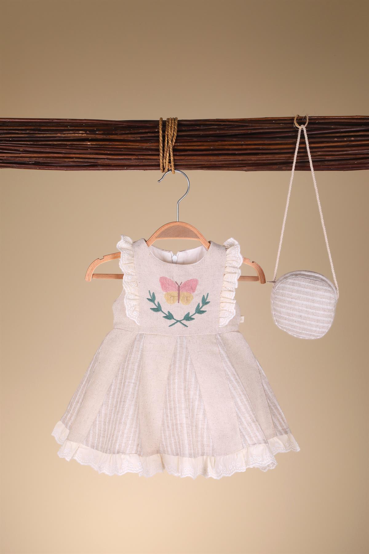 Kelebek Nakışlı Keten Kız Bebek Elbise Çantalı Bej
