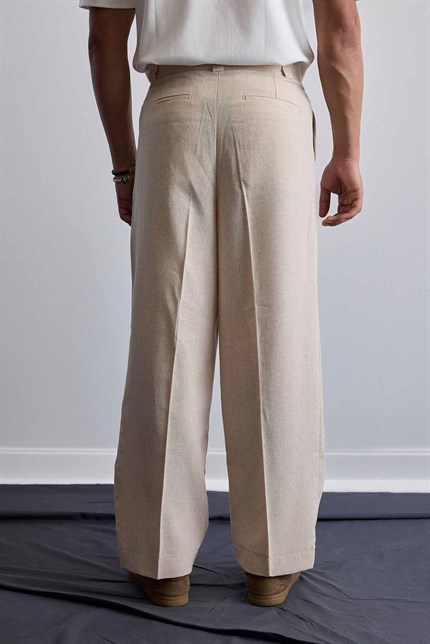 Erkek Relaxed Fit Bol Paça Keten Görünümlü Pileli Pantolon Bej