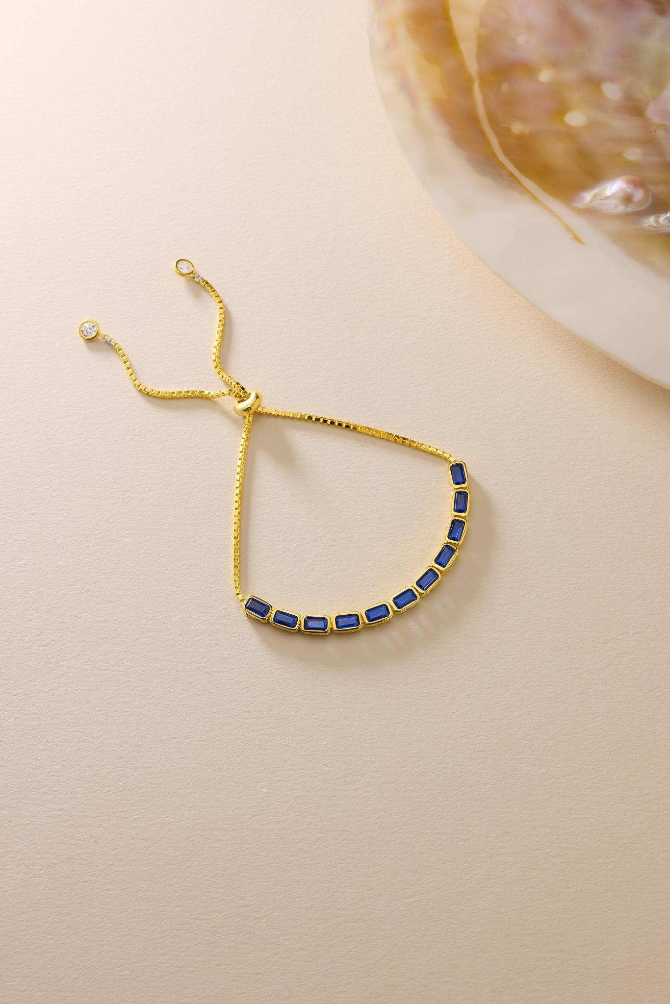 925 Ayar Gümüş Gold Kaplama Ayarlanabilir Asansörlü Sıralı Mavi Baget Taşlı Bileklik